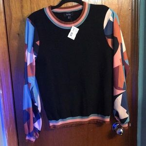 Small sized black sweater with colorful sleeves